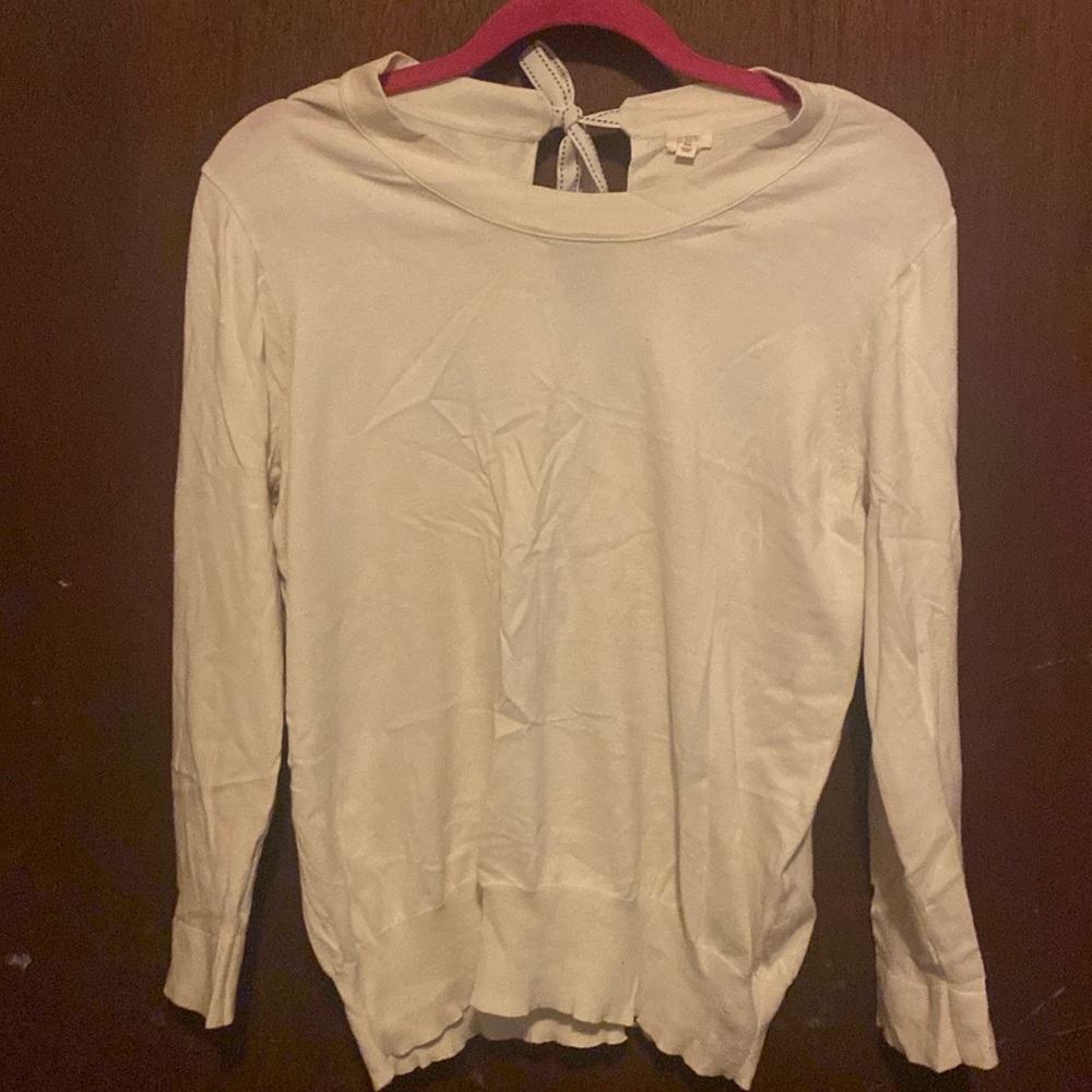 J. Crew cream colored sweater with decorative tie at back of neckline